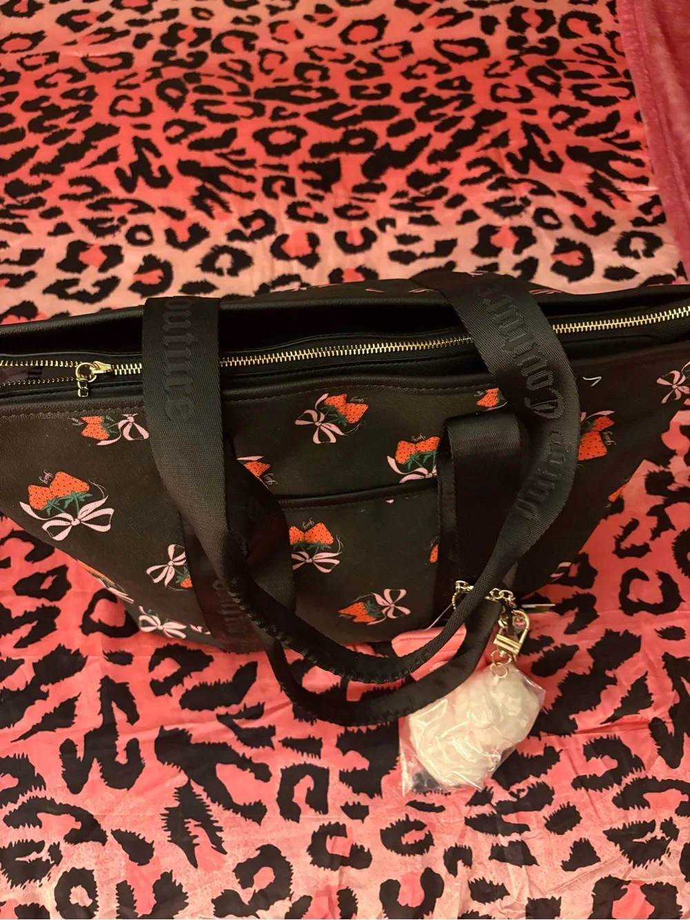 Black juicy couture tote bag with bag charms( super cute for back to school)